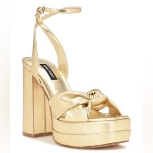 BRAND NEW !! Gold Nine West platforms